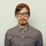Portrait of an interesting young man in winter clothes Portrait of an interesting young man in winter clothes